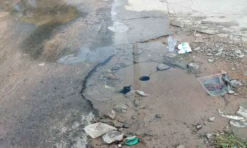 Water overflow turns road mishap-prone