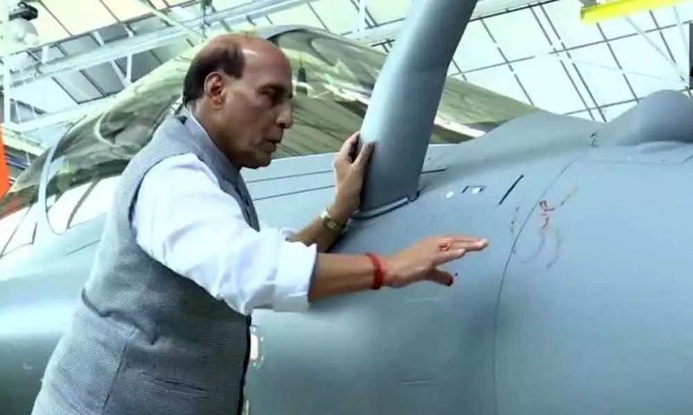 Rajnath Singh receives first of 36 French-built Rafale fighter jet