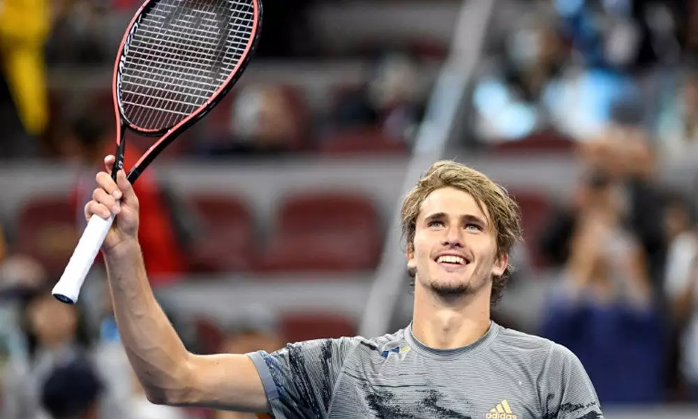 Zverev loses racquet into crowd on way to Shanghai last 16
