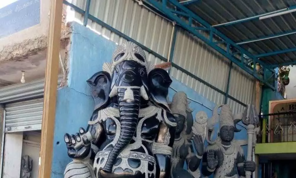 Here, Hindu gods idols are chiselled by members of various faiths