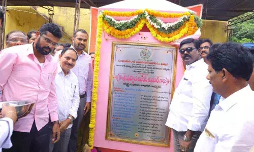Khammam: Puvvada lays stones for school, road works