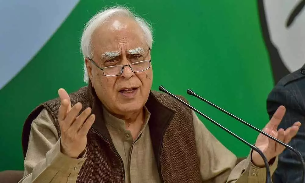 Show 56 inch chest, tell Xi to vacate PoK: Sibal hits out at PM ahead of summit