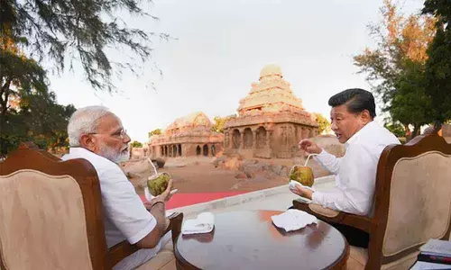 Jubilant mood prevails as Modi, Xi meet