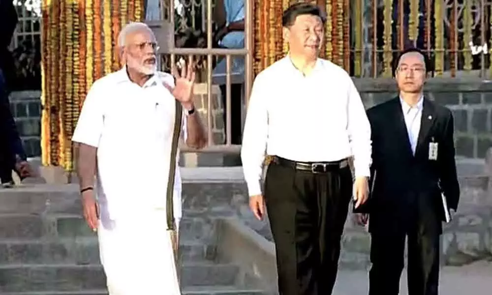 PM Modi dons Tamil Nadus traditional veshti as he welcomes Xi Jinping