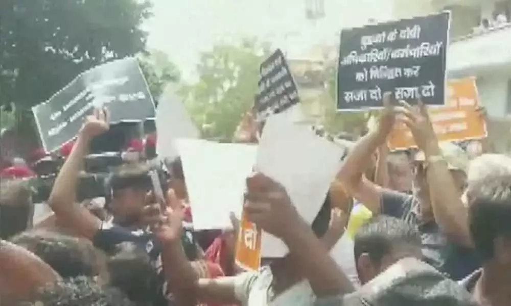 Bihar Floods: Locals protest outside Deputy CM Sushil Kumar Modi residence in Patna