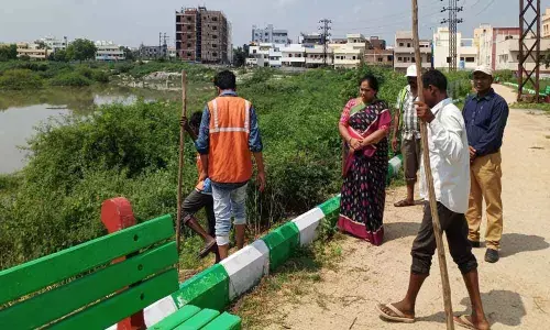 Corporator Cheruku Sangeetha inspects Bandlaguda cheruvu