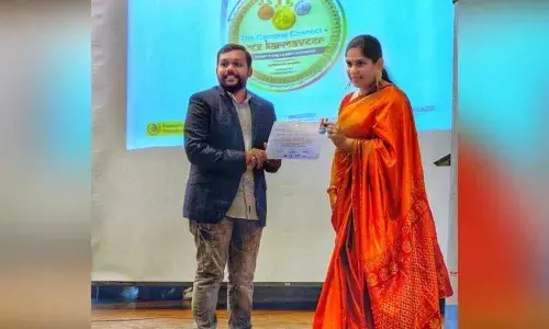 Santhosh gets award for service in cyber security