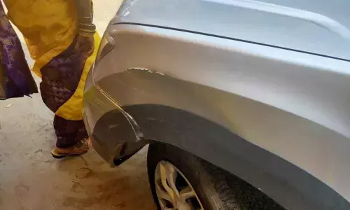 TSRTC temporary driver hits car, speeds away