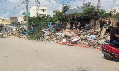 300 hut dwellers move into 2 BHK houses