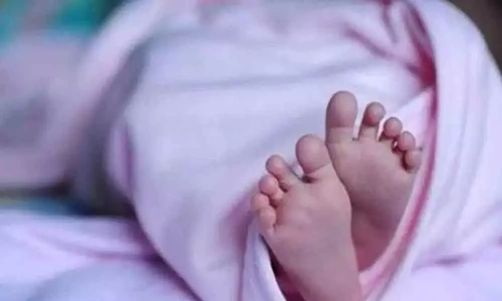 Found newborn girl in earthen pot three feet below while digging pit to bury his daughter