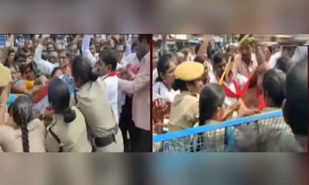 Woman RTC conductor faints in scuffle with police at Asifabad