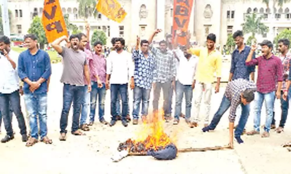 ABVP activists set CMs effigy on fire