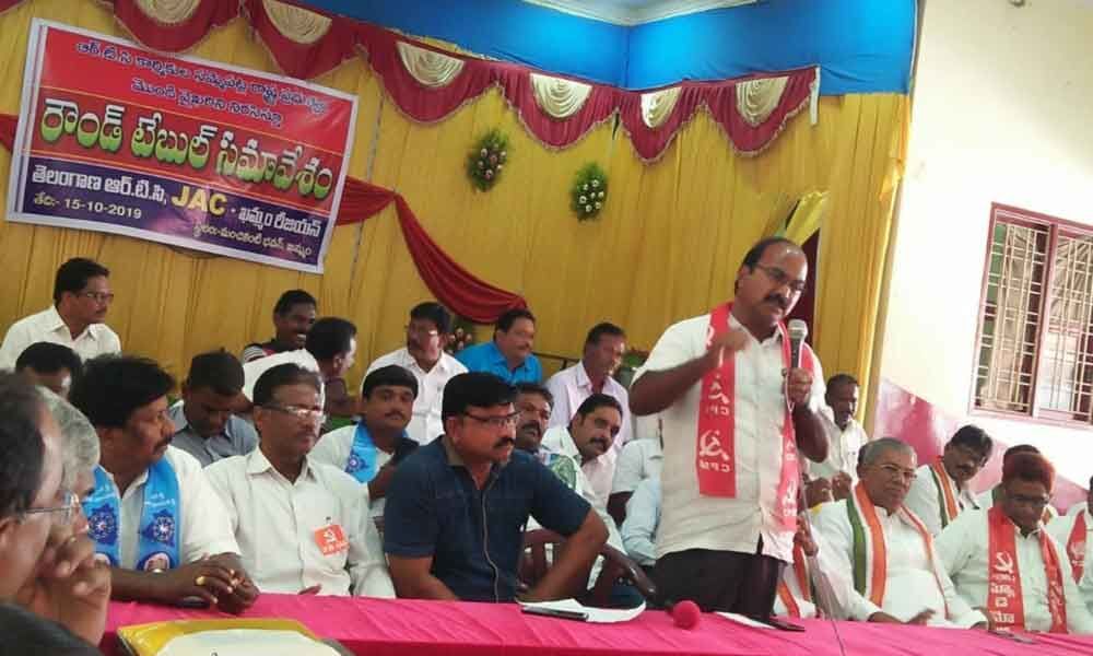 Khammam: Hold talks with RTC unions, opposition demands government