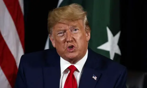 Donald Trump signs executive order to press Turkey to halt military offensive in Syria