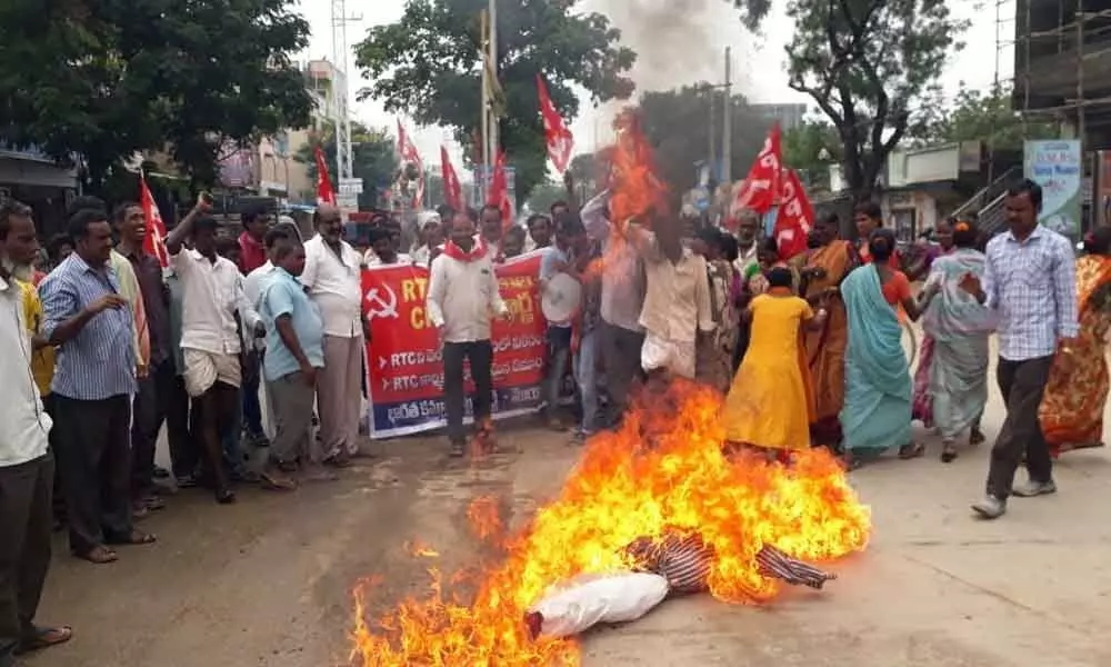CPI activists set CM effigy on fire