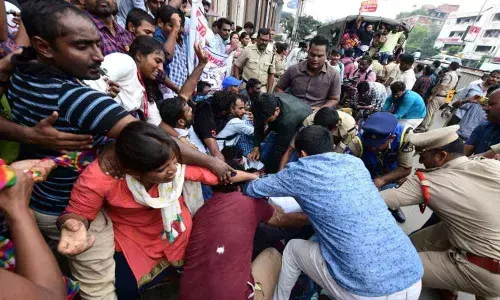 Trained teachers stage dharna at CMs residence in Hyderabad