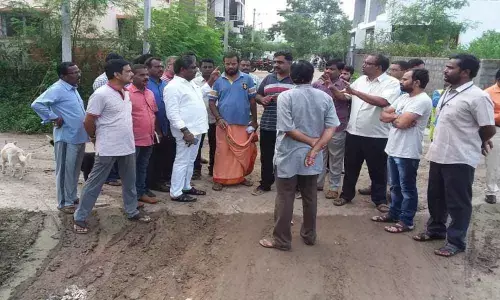 Corporator Muddam Narsimha Yadav learns about issues in Sai Nagar