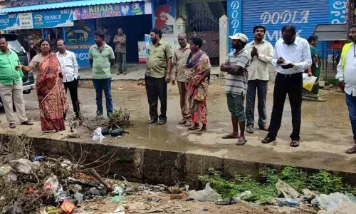 Corporator Pavani Reddy asks people not to litter garbage