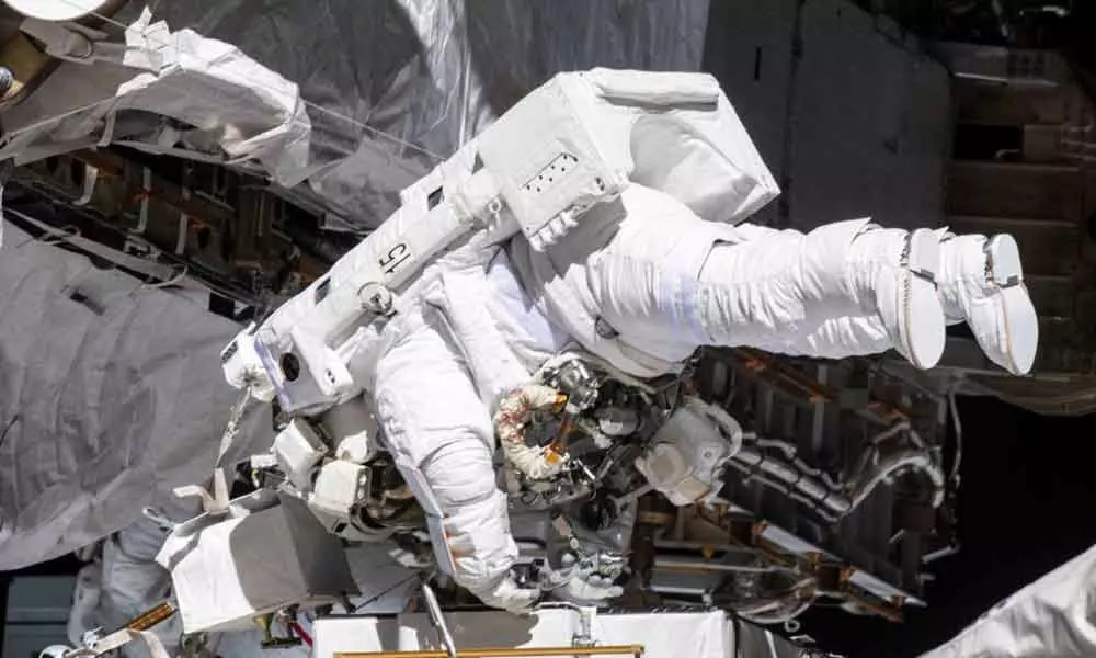 NASA astronauts conduct a first all-women spacewalk