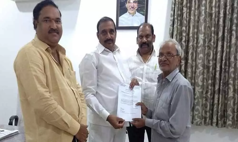MLA Arekapudi Gandhi hands over CMRF cheque