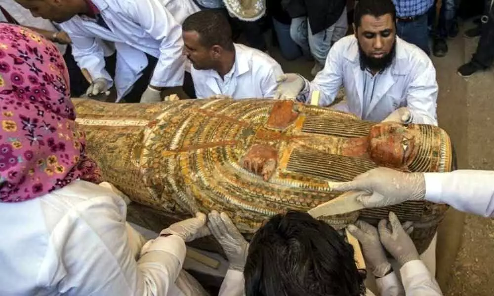 Egypt unveils trove of  ancient coffins excavated in Luxor