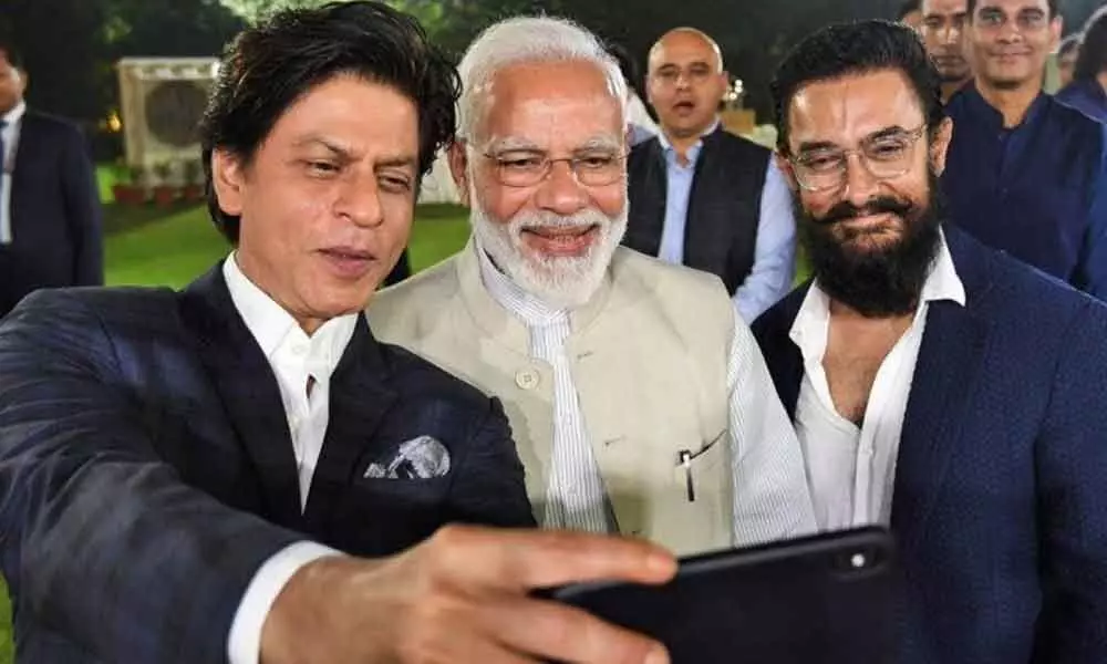 Shah Rukh, Aamir appreciate PM Modi for popularising Gandhis ideology via cinema