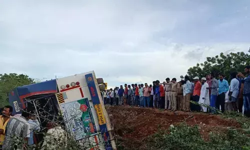 Bus overturned after dashing motorbike, two died and eight injured