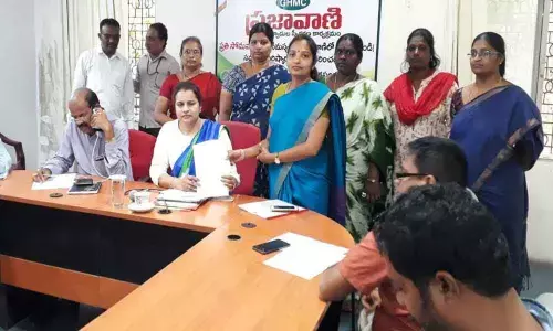 Corporator Pannala Kavya Harish Reddy points out uneven footpaths