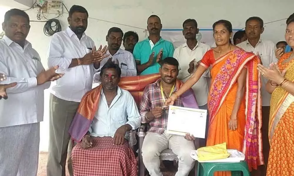 Sarpanch felicitates bronze medal winner in Karimnagar