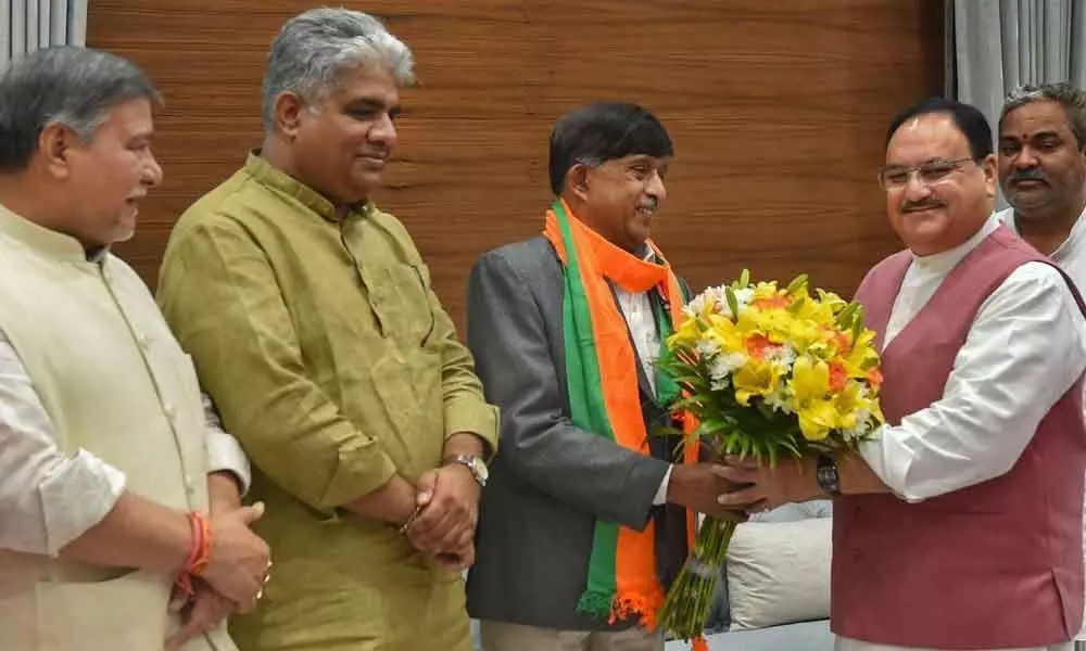 Ex-Congress RS MP Ramamurthy joins BJP