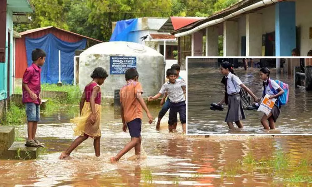 West Godavari: Schools flooded With water, Teachers held classes on Roads
