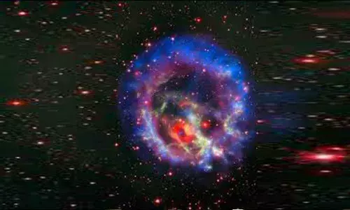 Massive galaxy found hidden amidst cosmic dust