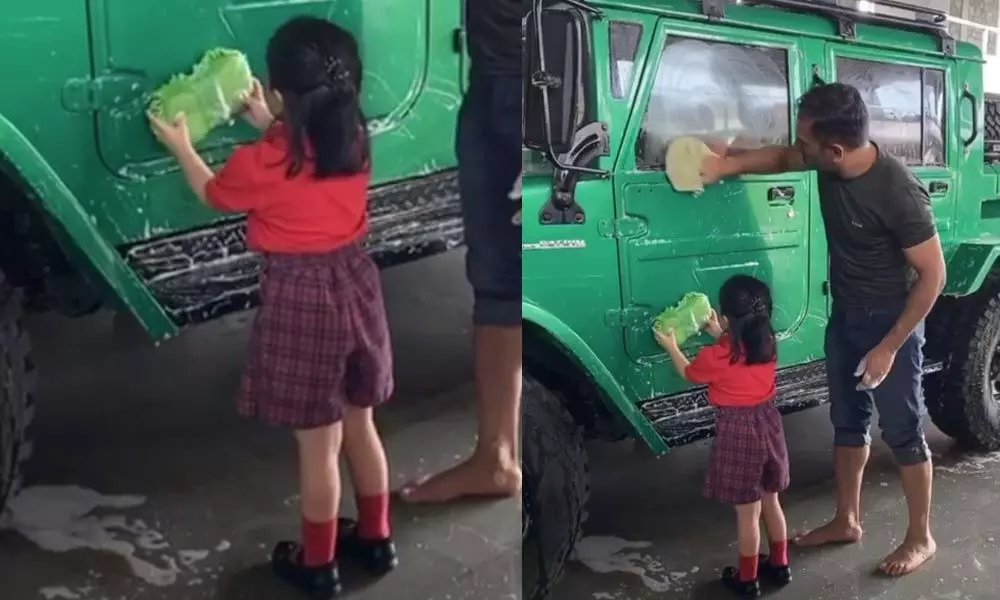 Like father, like daughter: Ziva Dhoni helps MS Dhoni clean up his car