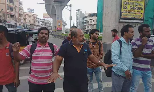 Vexed up with lesser buses, commuters stage Rasta Roko in Nalgonda