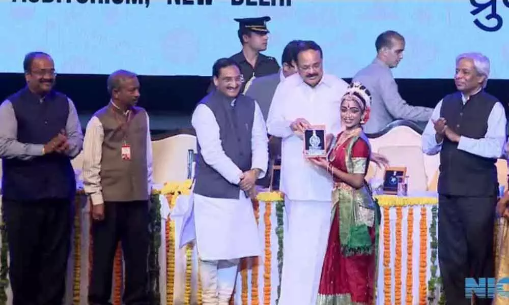 Kuchipudi dancer Vyshnavi gets an award in Warangal