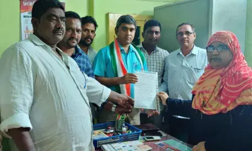 SPM workers demand festival bonus in Asifabad