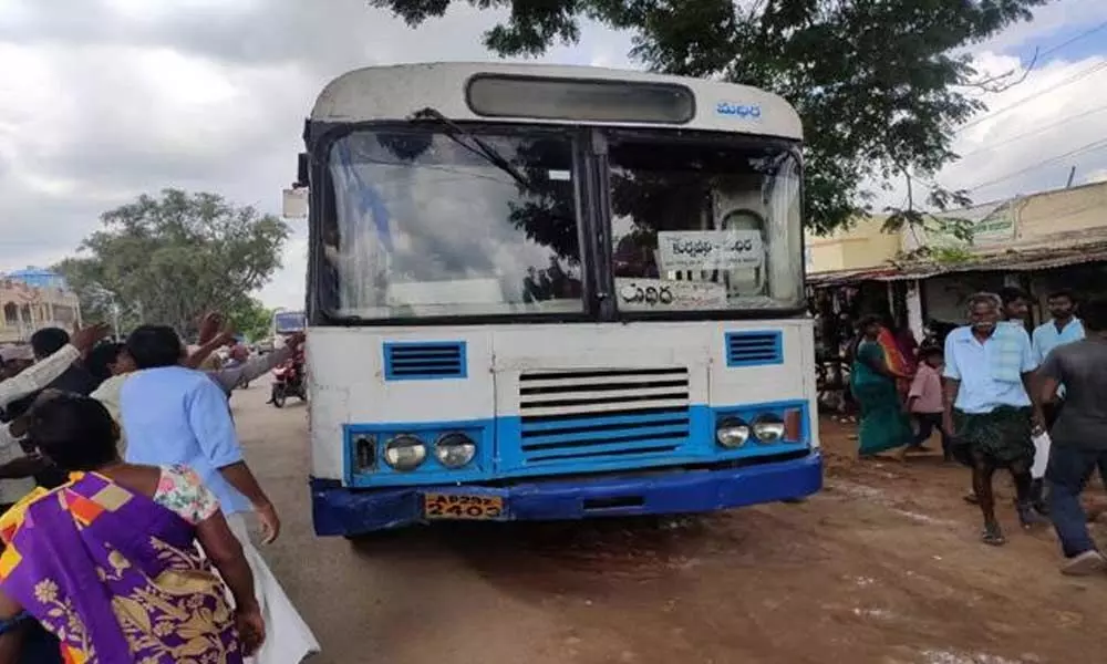 RTC bus hits bike in Khammam district