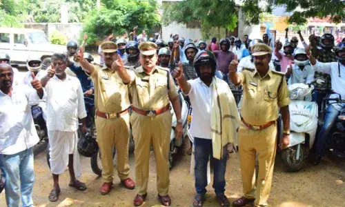 Villagers pledge to wear helmets in Nirmal