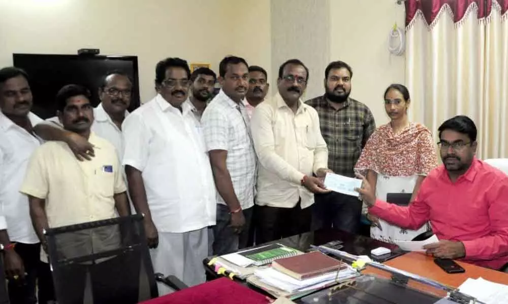 Nirmal: Cheques distributed to ration shop dealers