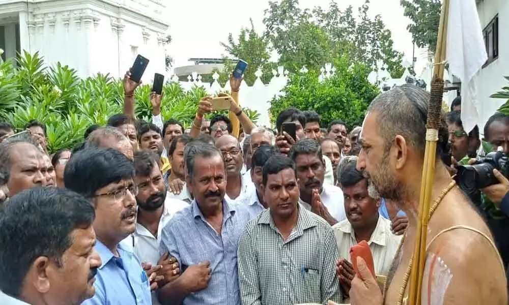 RTC workers urge seer to impress upon KCR