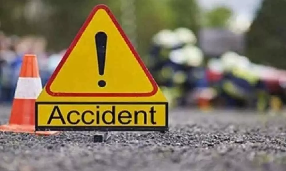 Couple died in a road accident at Peddamberpet Outer Ring Road
