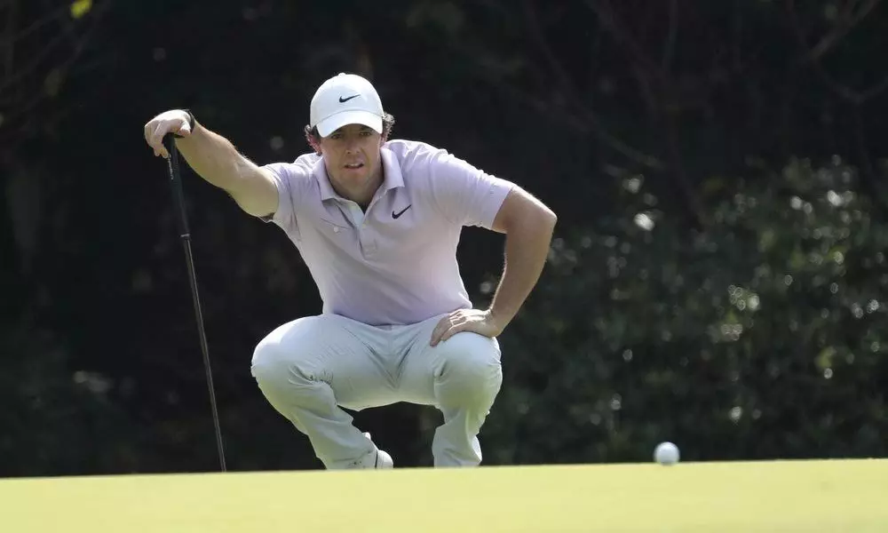 McIlroy takes 1-shot lead into final round in Shanghai