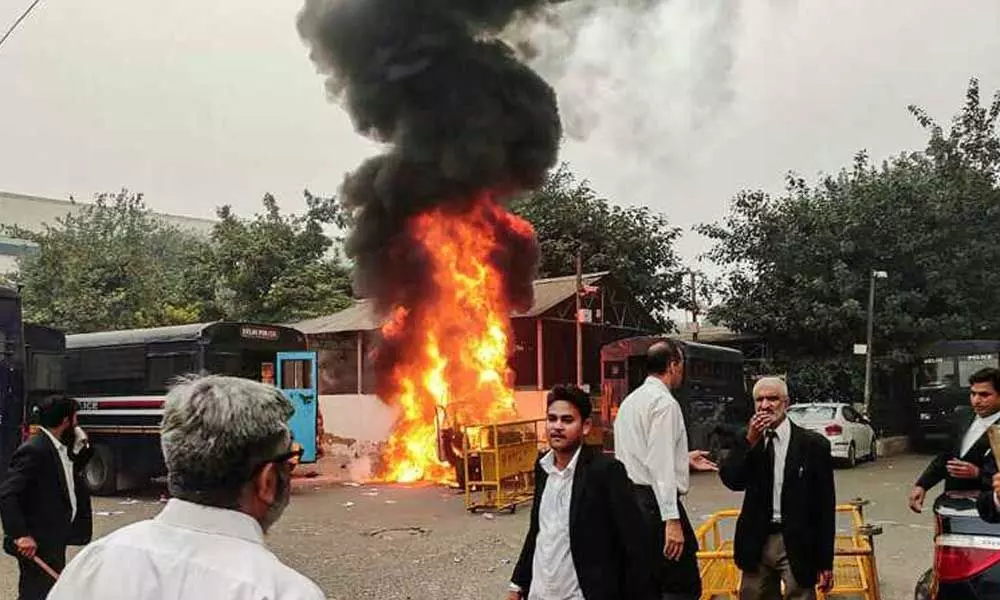 Lawyer injured, police vehicle torched as cops, advocates clash at Delhis Tis Hazari Court