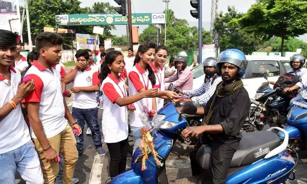 Students promote road safety with roses in Visakhapatnam
