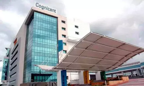 After job cuts, Cognizant halts hikes for senior employees