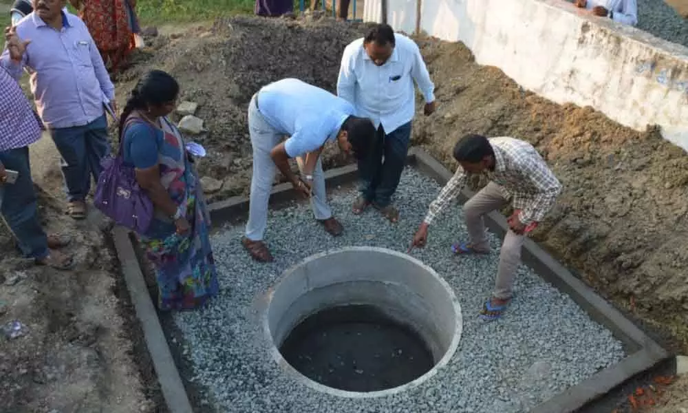 ITDA PO inspects the construction of soak pits in Kothagudem