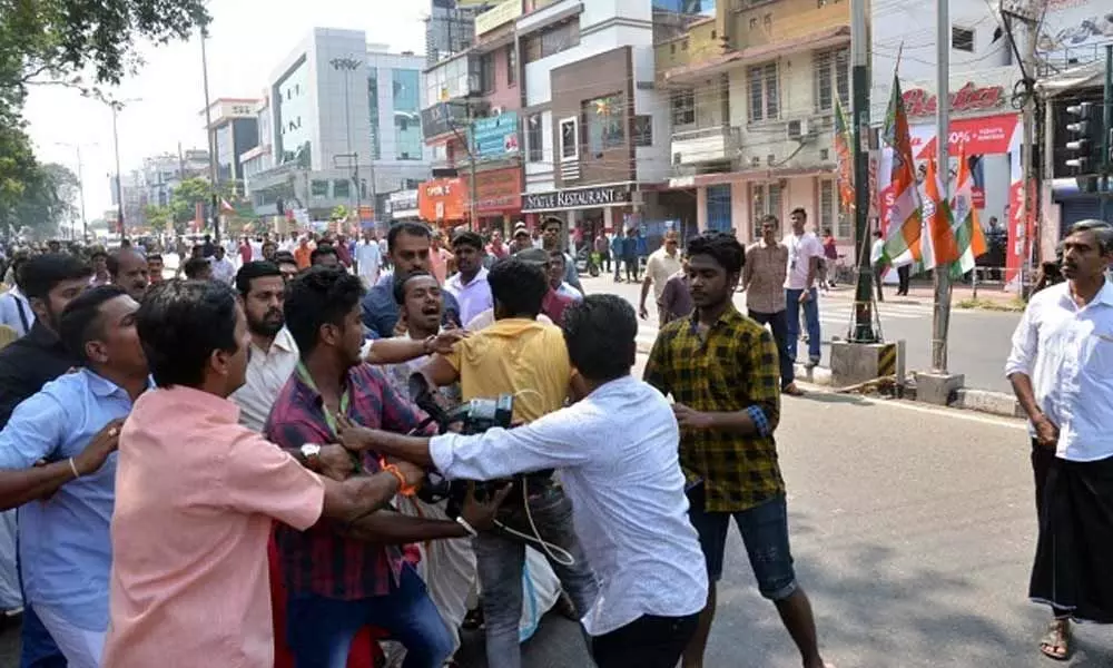 TN: Police throws stick at youth riding triples, enrages crowd