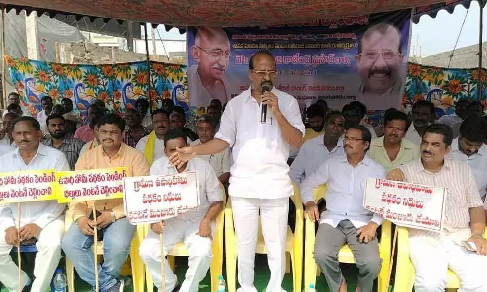 Ex-sarpanches stage dharna for release of funds  in Vizianagaram