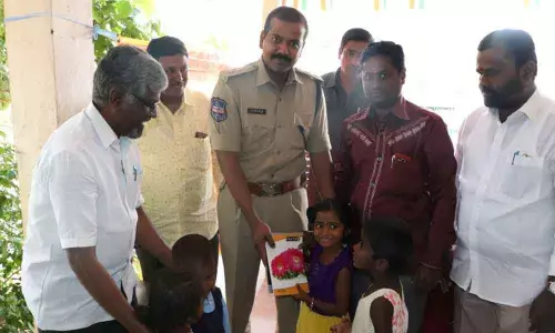 Police Commissioners gesture to students