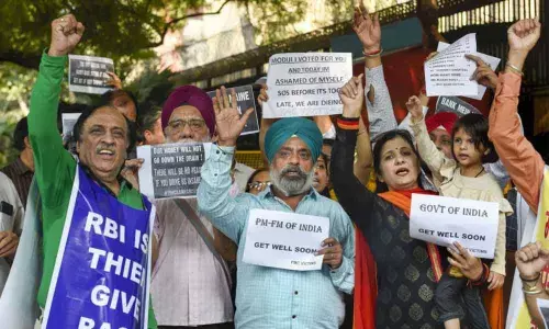 New Delhi: PMC account holders protest in front of RBI